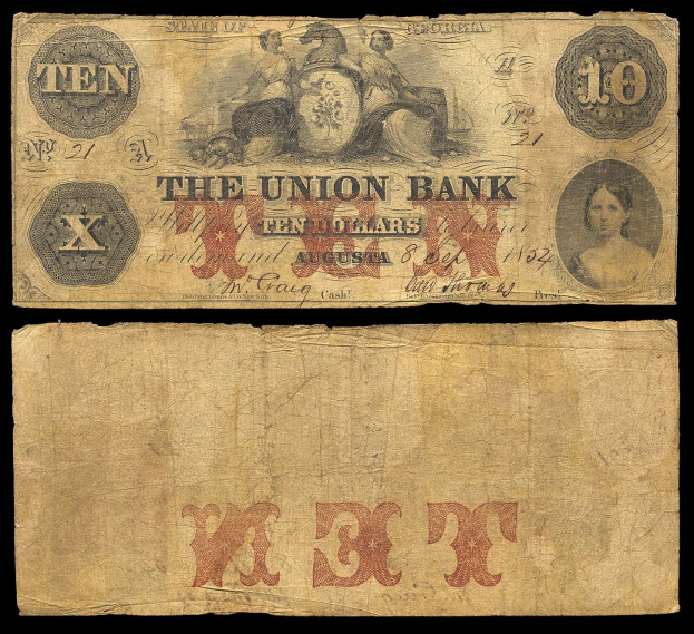 Alte Zehn-Dollar-Note der Union Bank, 1862, mit Abbildung einer Frau in einem Kleid mit Haaren im Dutt, ernster Gesichtsausdruck, auf schwarzem Hintergrund mit weißer, fetter "Union Bank"-Aufschrift.