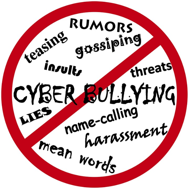Ein Schild mit der Aufschrift "Cybermobbing" in fetter, schwarzer Schrift auf weißem Hintergrund.