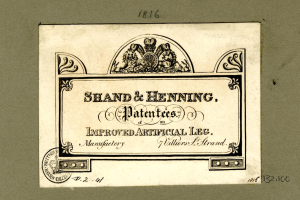 Papierdokument mit der Überschrift "Shand & Henning Patentes, Verbesserte Kunstliche Bein" mit einem Logo und numerischen Markierungen unten.