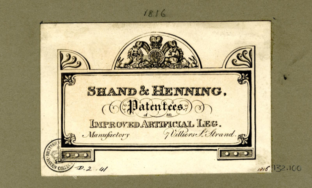 Papierdokument mit der Überschrift "Shand & Henning Patentes, Verbesserte Kunstliche Bein" mit einem Logo und numerischen Markierungen unten.