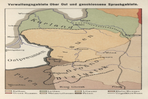 Plakat mit einem detaillierten Kartenbild des Deutschen Reiches in der Mitte, umgeben von Text, das das Ausmaß des britischen Empire mit geografischen Merkmalen und beschrifteten Städten zeigt.