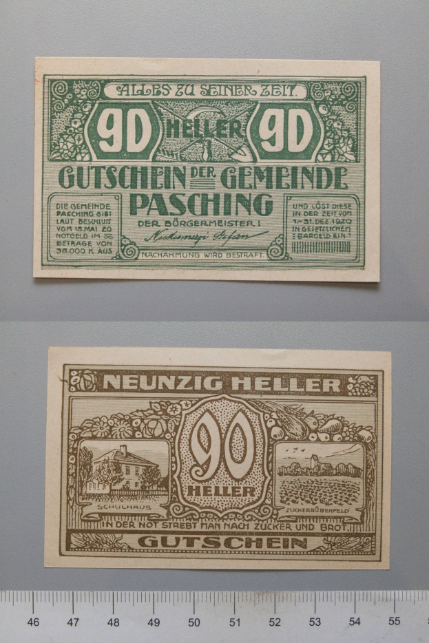 Alte deutsche Banknote mit Lineal daneben, mit Text und Zahlen, mit einer Skala unten.
