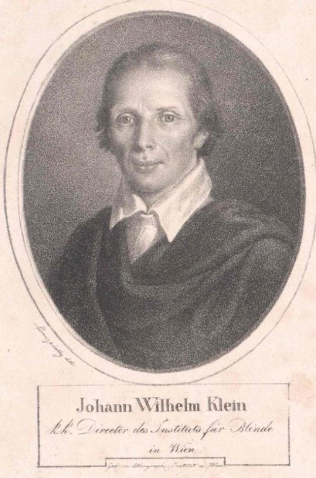 Schwarz-weiß-Porträt von Johann Wilhelm Klein, der einen weißen Hemd trägt und ernst schaut, mit deutschem Text unten.