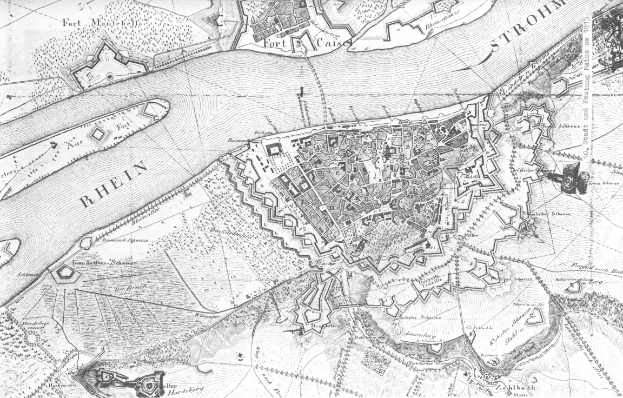 Eine Schwarz-Weiß-Karte der Stadt Rhein mit Straßen, Gebäuden und anderen Merkmalen sowie Textbeschriftungen.